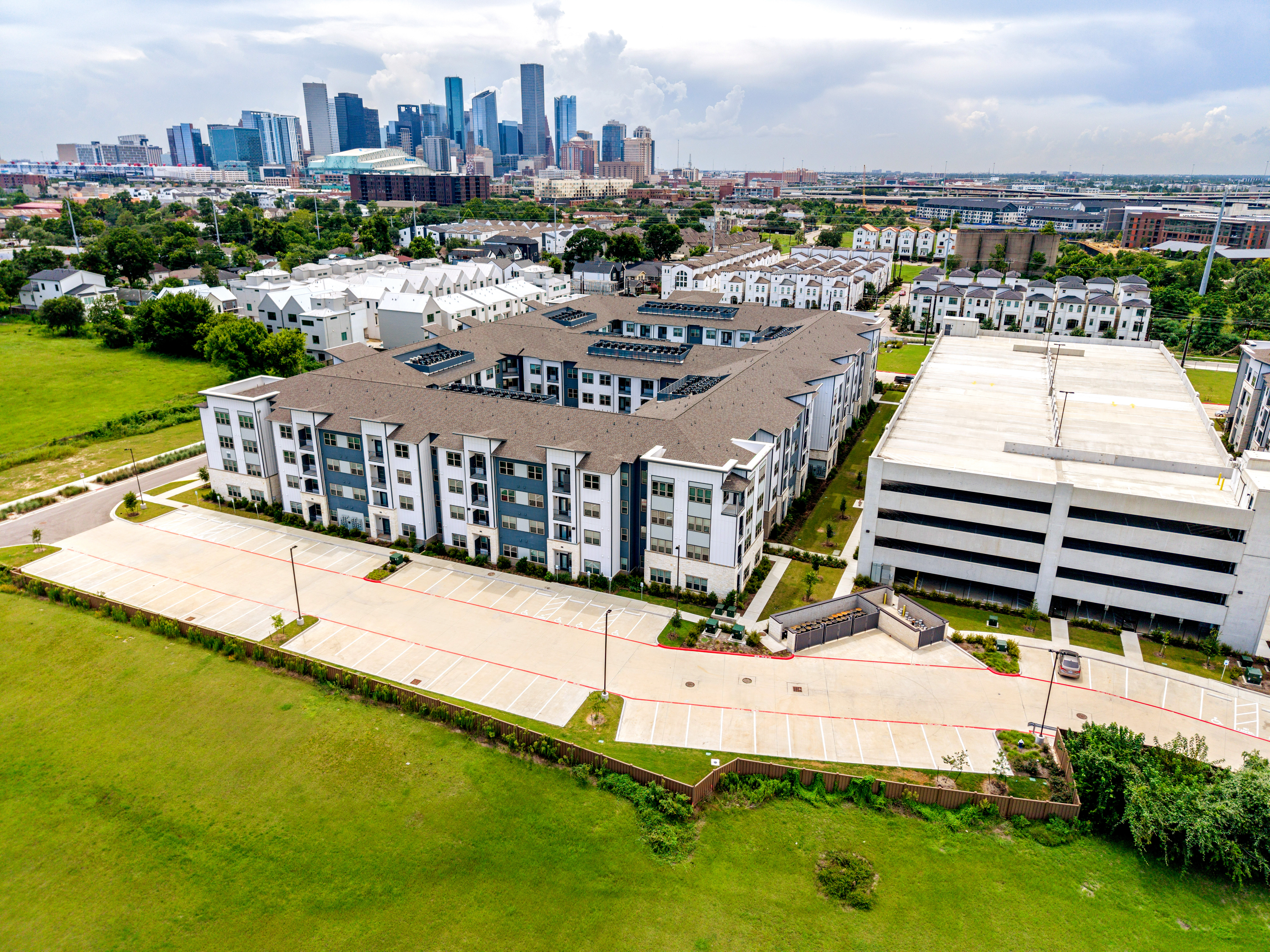 Aerial photograph of a Houston retail center rooftop and signage