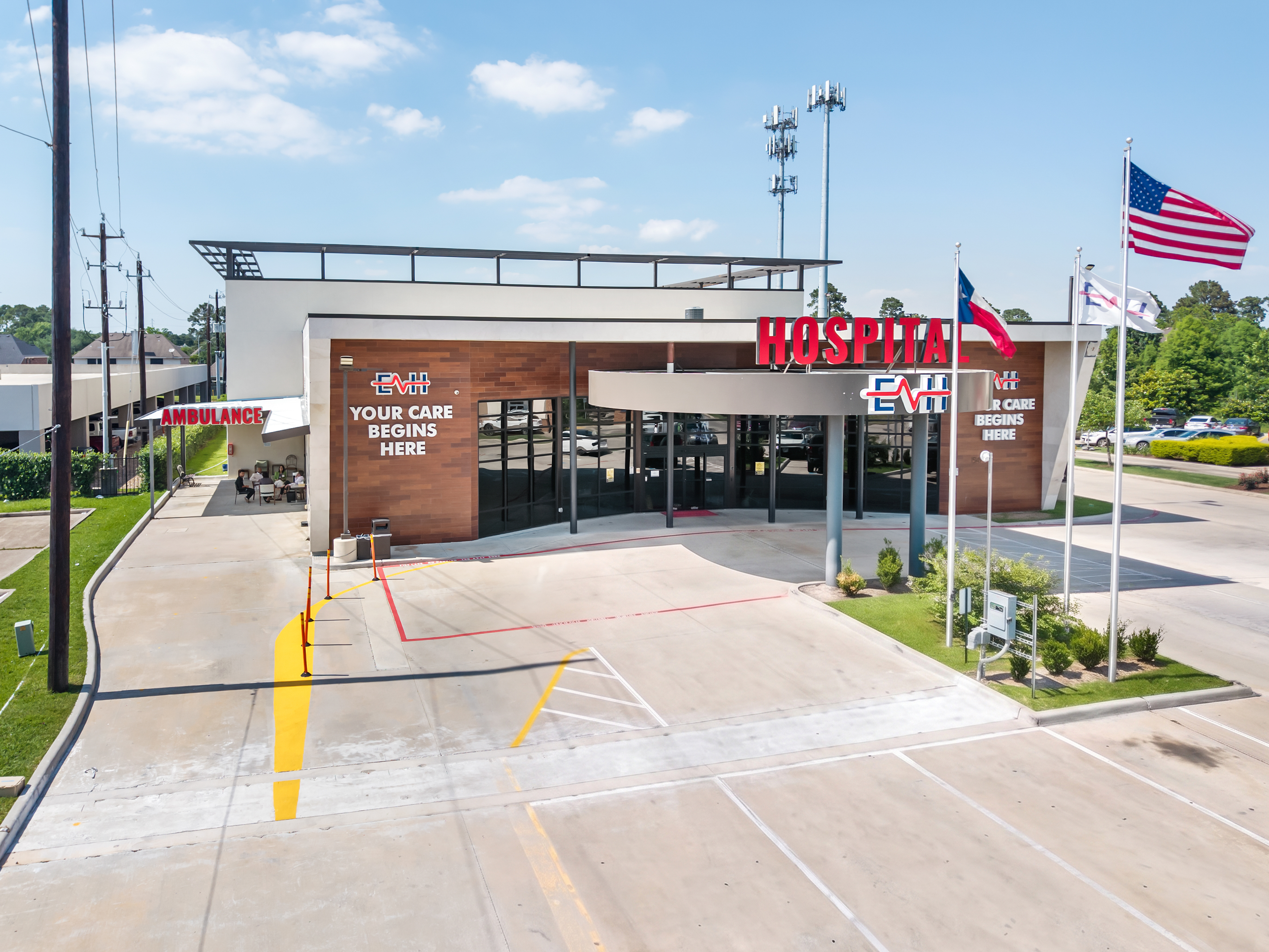 Aerial daytime photograph of a hospital entrance