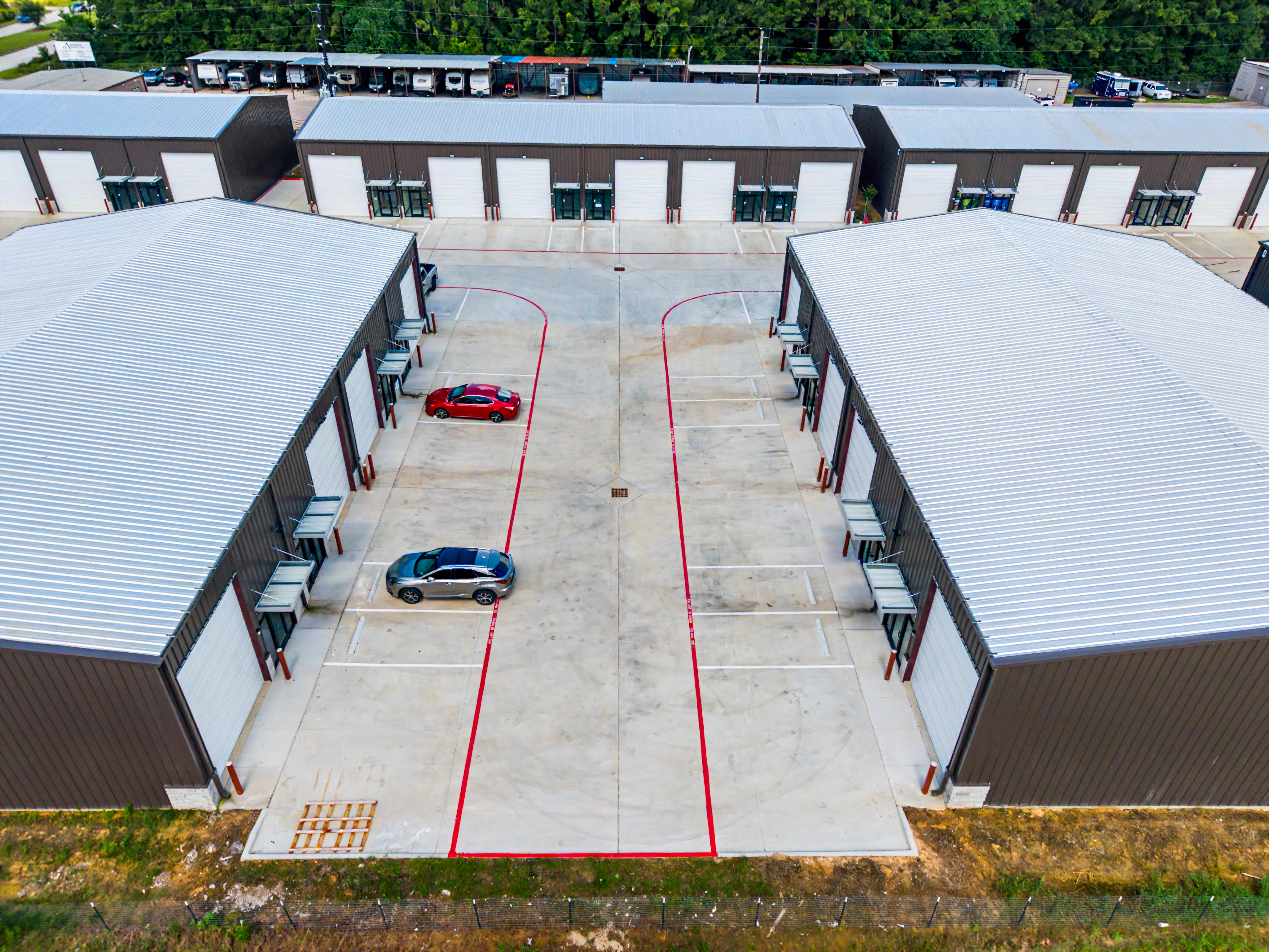 Aerial close-up photograph of commercial warehouse loading bays