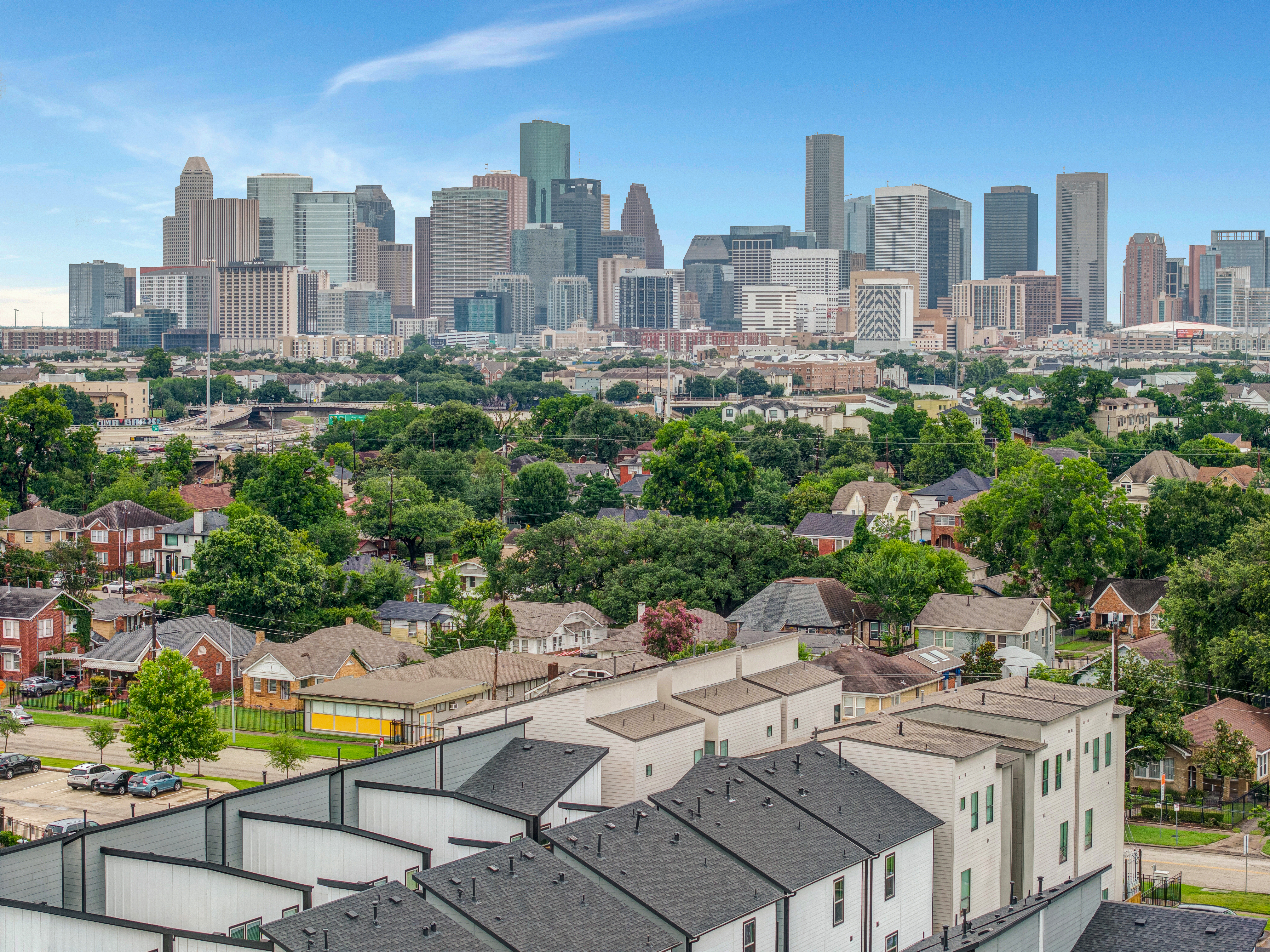 Aerial photograph of a Houston shopping center parking lot