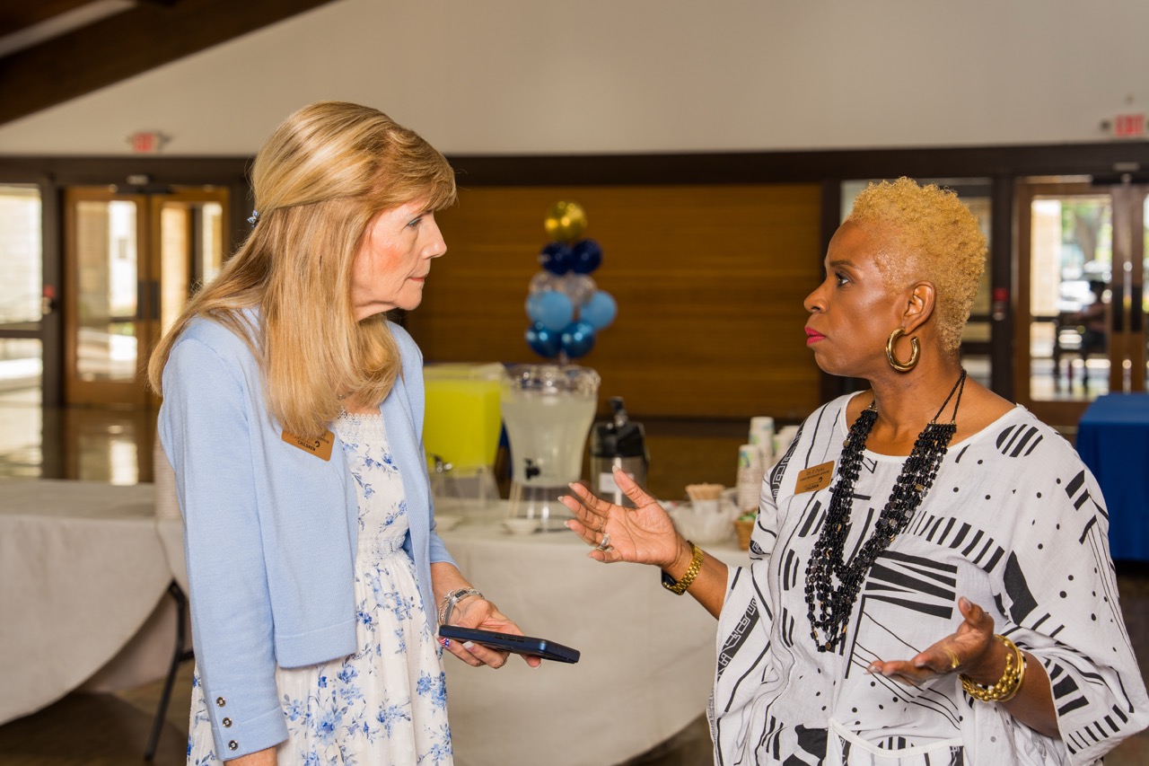 Guests conversing at a corporate reception