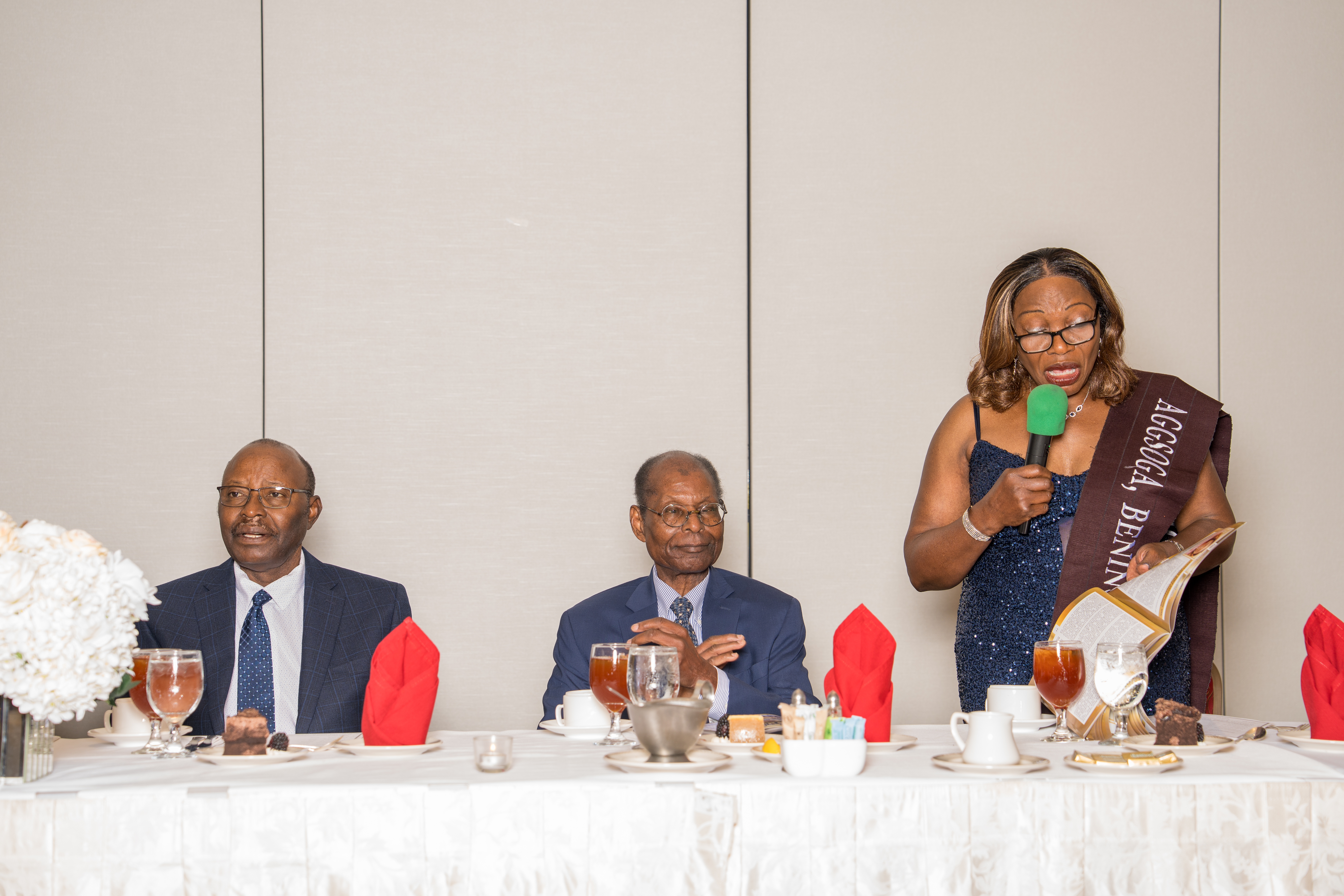 Corporate event speakers addressing guests at a Houston banquet