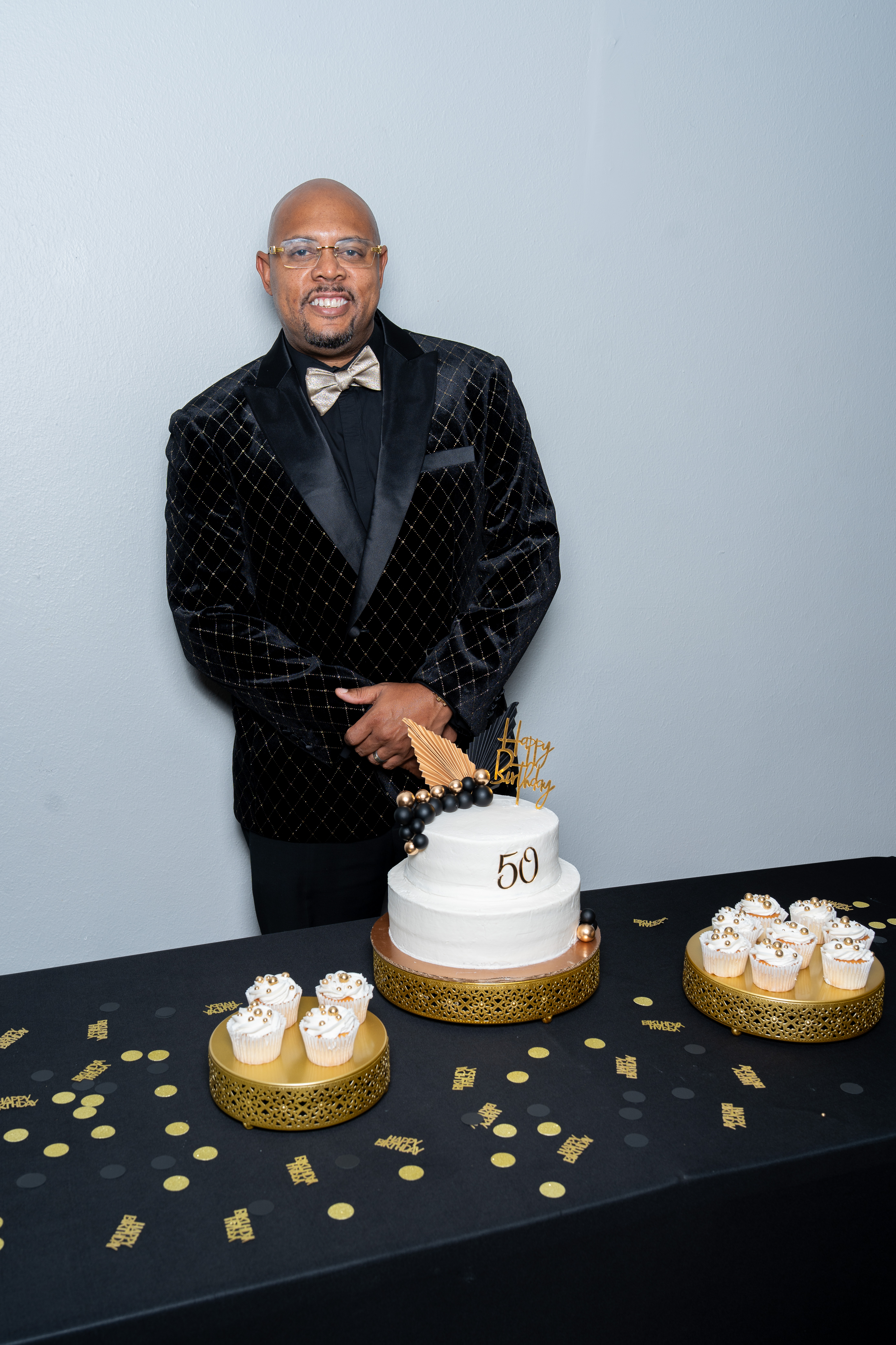 Couple embracing at a baby shower gender reveal celebration