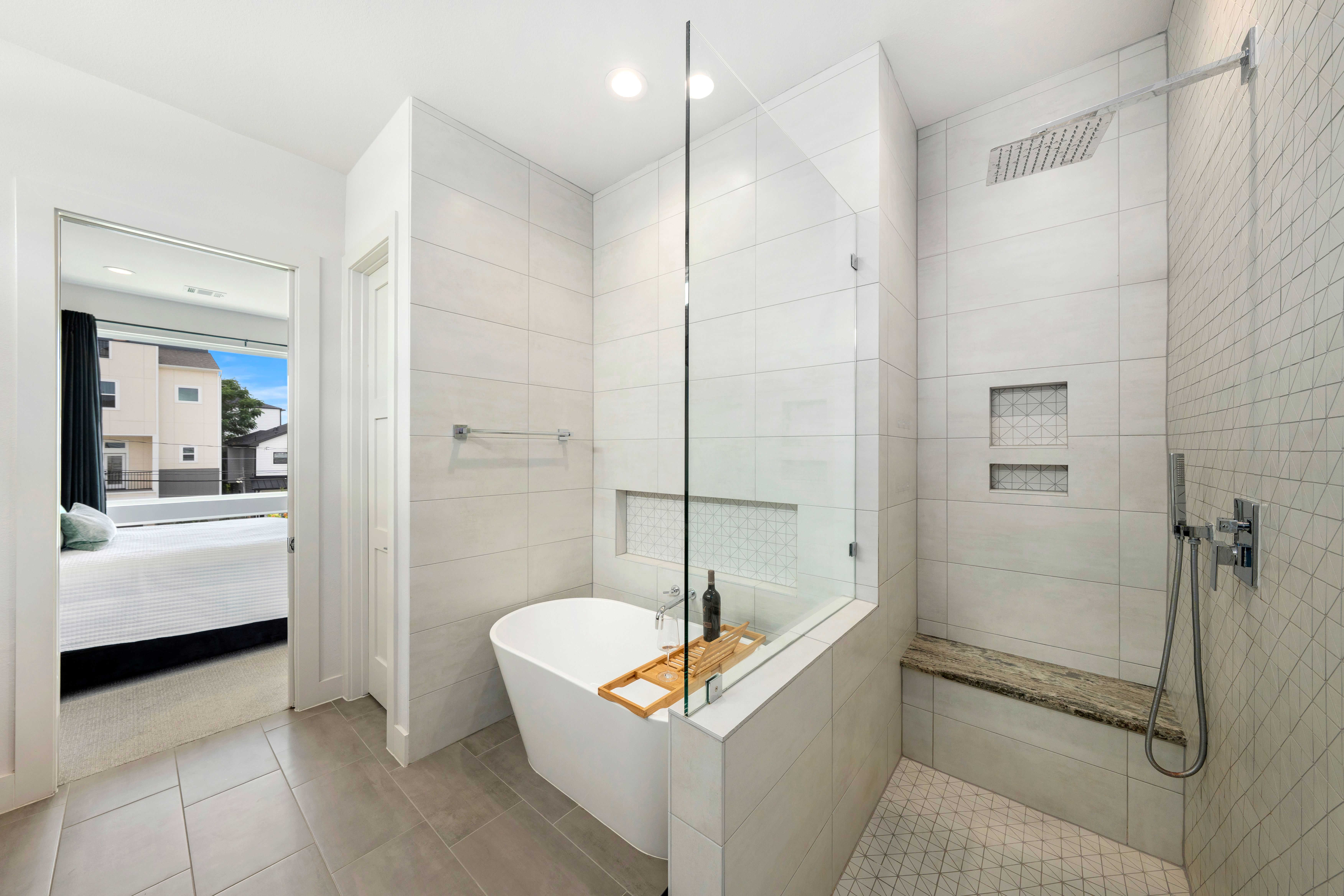 Modern white bathroom with glass-enclosed shower